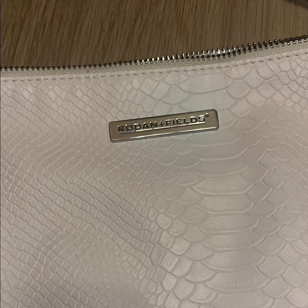 Rodan + Fields White Embossed Clutch - Picture 3 of 6